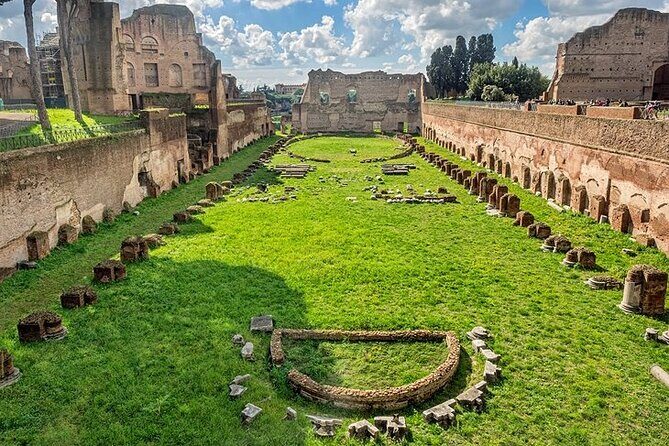 Colosseum Arena Floor with Roman Forum and Palatine Hill Tour - Walking comfort: uneven stone, shoes, water, and pace