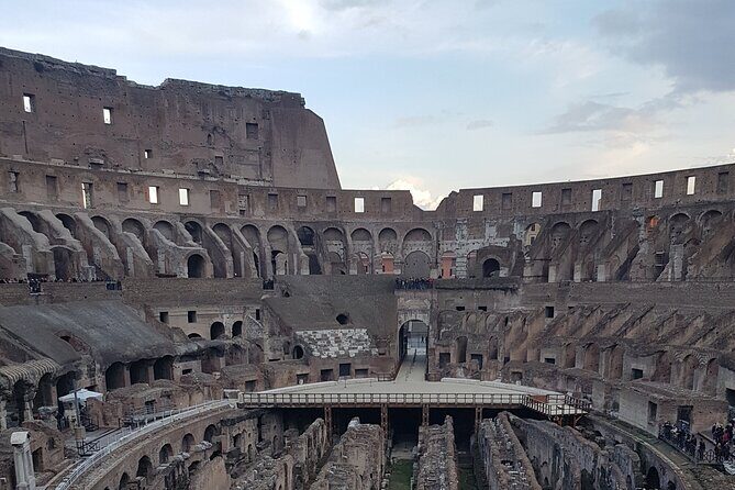 Colosseum Guided Tour and Ancient Rome - Stop 3: Roman Forum tickets and monument views on ancient streets