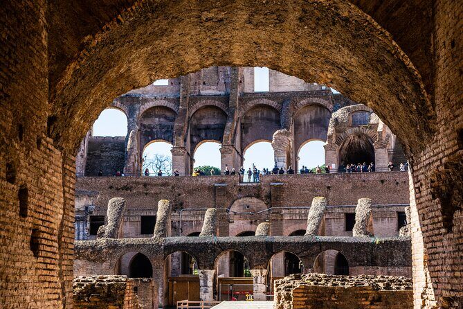 Colosseum Guided Tour and Ancient Rome - Stop 1: The Colosseum (arena views, underground section, and changing art)