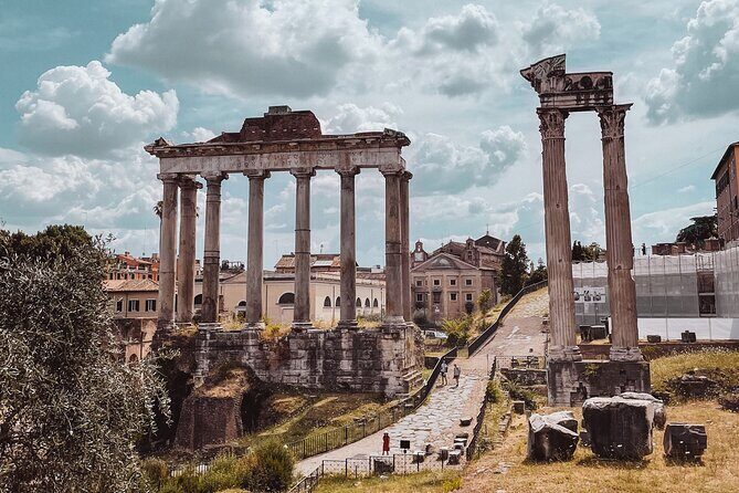 Colosseum Guided Tour with Roman Forum & Palatine Hill - Roman Forum Walk: Caesar’s Tomb and the Old Road to Power