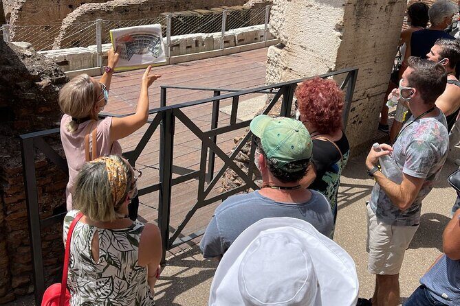 Guided Group Tour of Colosseum, Roman Forum and Palatine Hill - Entering the Colosseum: gladiators, naval combat, and real context