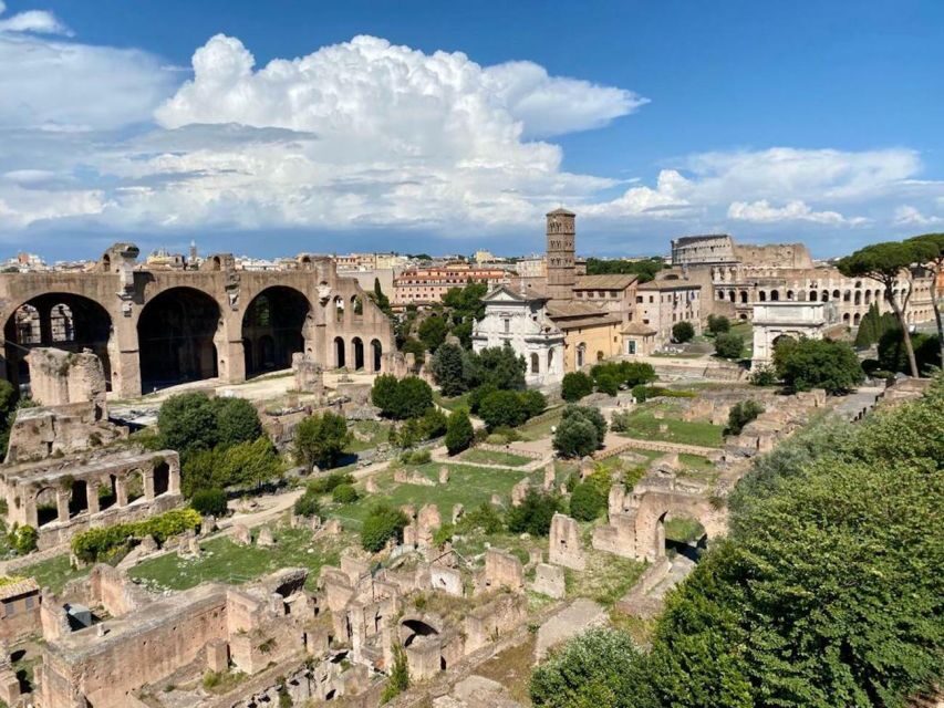 Rome: Colosseum and Roman Forum Small Group Tour in German - The Roman Forum walk: temples, courts, shops, and legends