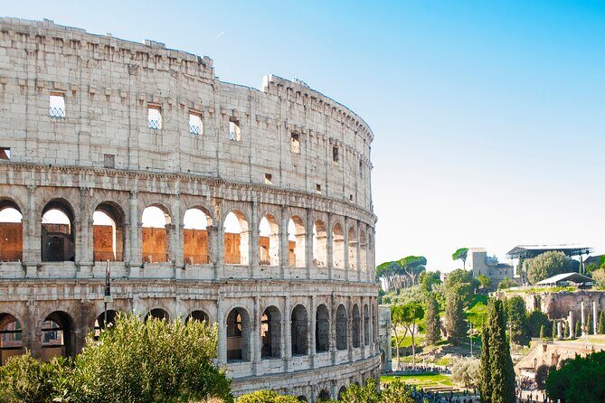 Rome: Colosseum Arena, Roman Forum and Palatine Hill Guided Tour - Entering The Colosseum Through the Gladiator Gate