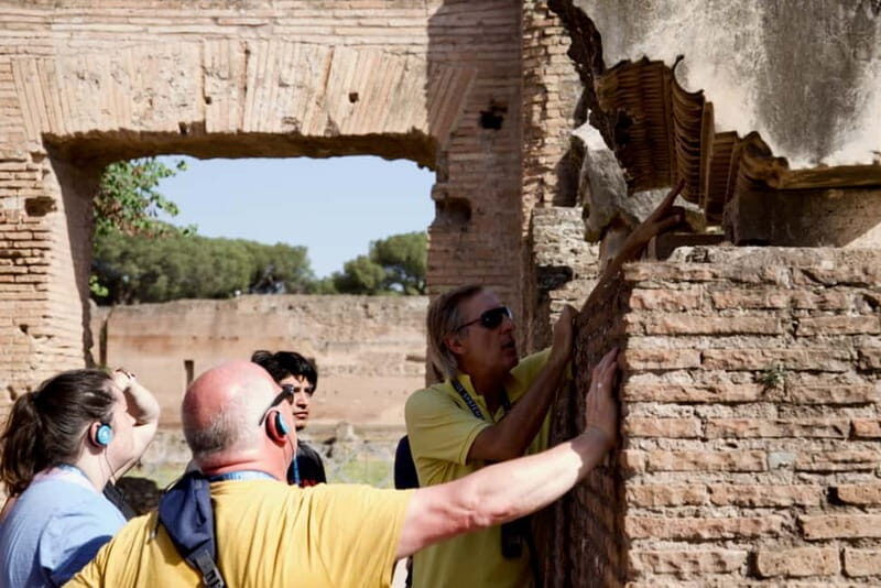 Rome: Colosseum & Roman Forum Guided Tour - Roman Forum time: Sacred Road, power, and everyday contrasts