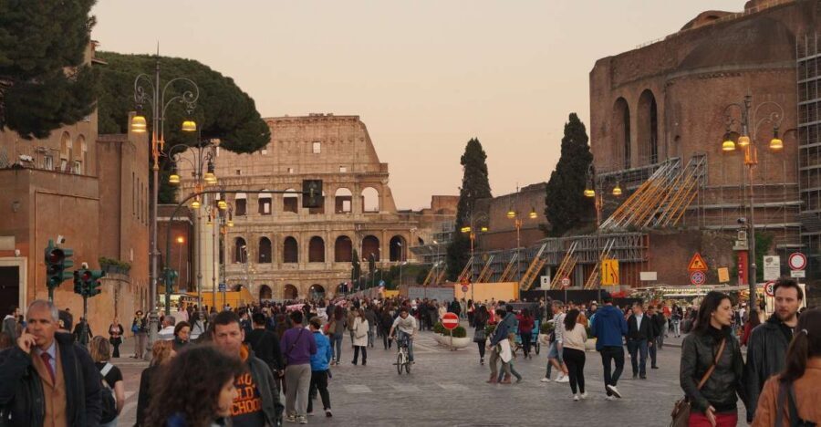 Rome: Colosseum, Roman Forum & Trajan's Market Exterior Tour - Colosseum from the outside: crowds, emperors, and the engineering behind it