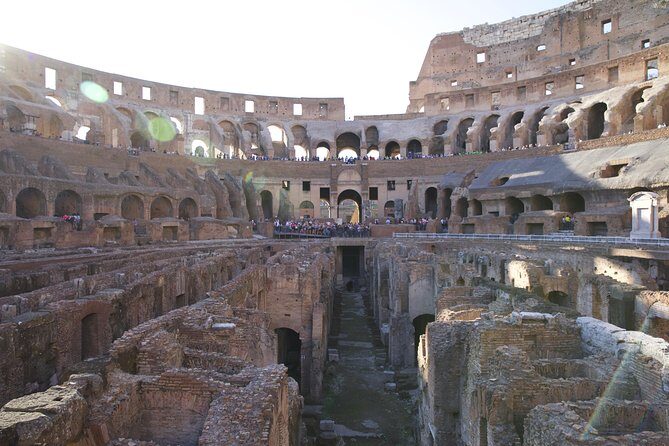 Rome: Colosseum Underground and Roman Forum Guided Tour - Entering the Colosseum Arena: Stage Views and a Real Sense of Scale